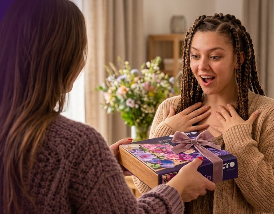 Woman giving an OKTO 3D clay art kit as a gift